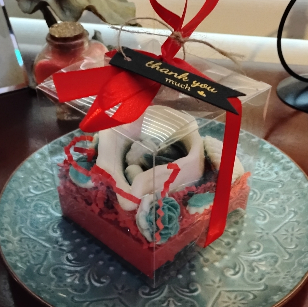 Red Gift Box With A Green And White Scented Seashell Candle Set
